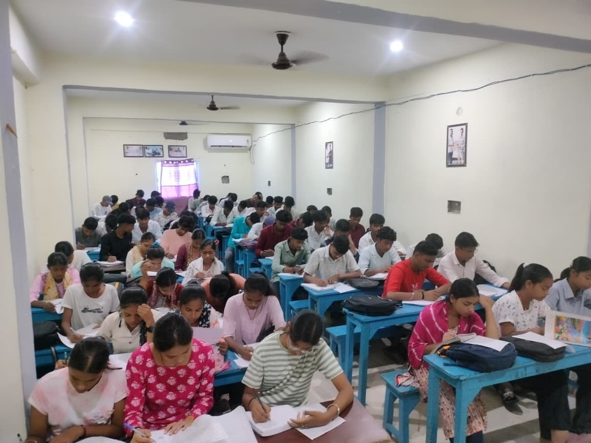A full batch of Parth Academy students taking a weekly full-syllabus test